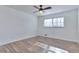 Well-lit bedroom, featuring wood-look floors and a ceiling fan at 4593 Bexley Way, Stone Mountain, GA 30083