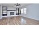 Spacious living room featuring a fireplace and built-in shelving at 4593 Bexley Way, Stone Mountain, GA 30083