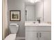 Clean bathroom with white vanity and a framed print at 5571 Hislop Ln # 41, Mableton, GA 30126