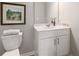 Clean bathroom with white vanity and a framed print at 5571 Hislop Ln # 41, Mableton, GA 30126