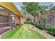 Landscaped backyard with brick wall and garden at 6 Westchester Sq, Decatur, GA 30030