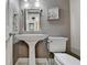 Charming bathroom with pedestal sink and updated toilet at 6 Westchester Sq, Decatur, GA 30030