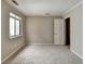 Neutral-toned bedroom featuring carpeted floor and window at 6 Westchester Sq, Decatur, GA 30030