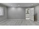 Grey-walled bedroom with carpet flooring and en-suite bathroom access at 6 Westchester Sq, Decatur, GA 30030