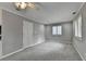 Spacious bedroom with grey walls, carpet, and built-in shelving at 6 Westchester Sq, Decatur, GA 30030