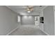 Bright bedroom featuring grey walls, ceiling fan, and carpet flooring at 6 Westchester Sq, Decatur, GA 30030