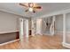 Bright dining room with hardwood floors and access to kitchen at 6 Westchester Sq, Decatur, GA 30030