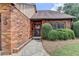 Brick facade with a 2-car garage and walkway at 6 Westchester Sq, Decatur, GA 30030