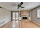 Gathering room with brick fireplace and hardwood floors at 6 Westchester Sq, Decatur, GA 30030