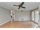 Gathering room with hardwood floors and access to the backyard at 6 Westchester Sq, Decatur, GA 30030