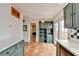 Eat-in kitchen with built-in shelving and French doors at 6 Westchester Sq, Decatur, GA 30030