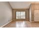 Light-filled living room with hardwood floors and window at 6 Westchester Sq, Decatur, GA 30030