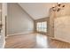 Spacious living room with hardwood floors and vaulted ceiling at 6 Westchester Sq, Decatur, GA 30030