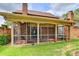 Screened porch with tiled floor and ceiling fan at 6 Westchester Sq, Decatur, GA 30030