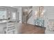 Bright dining area with hardwood floors and access to the kitchen at 1182 Chastain Dr # 8, Sugar Hill, GA 30518