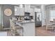 Modern kitchen with stainless steel appliances and granite countertops at 1182 Chastain Dr # 8, Sugar Hill, GA 30518