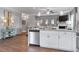 Kitchen with island, stainless steel appliances, and breakfast nook at 1182 Chastain Dr # 8, Sugar Hill, GA 30518