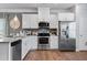 Well-equipped kitchen featuring stainless steel appliances at 1182 Chastain Dr # 8, Sugar Hill, GA 30518