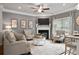 Cozy living room featuring a fireplace and comfy armchairs at 1182 Chastain Dr # 8, Sugar Hill, GA 30518