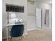 Upstairs hallway with 9ft ceilings and doors to bedrooms at 1182 Chastain Dr # 8, Sugar Hill, GA 30518