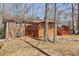Spacious brick home with a wooden deck and stairs leading to the yard at 3660 Hickory Se Cir, Smyrna, GA 30080