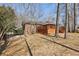 Brick home with a large wooden deck overlooking a spacious backyard, ideal for outdoor living at 3660 Hickory Se Cir, Smyrna, GA 30080
