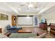 Finished basement featuring a home theater setup with a comfortable seating area and screen at 3660 Hickory Se Cir, Smyrna, GA 30080