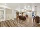 Spacious finished basement with wood-look flooring, entertainment area, and a walkout door at 3660 Hickory Se Cir, Smyrna, GA 30080