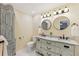 Bathroom features double vanity, granite countertops, and stylish decor at 3660 Hickory Se Cir, Smyrna, GA 30080
