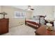 Traditional bedroom with wood furniture, a window and carpet flooring at 3660 Hickory Se Cir, Smyrna, GA 30080