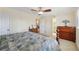 Comfortable bedroom featuring a ceiling fan and natural light at 3660 Hickory Se Cir, Smyrna, GA 30080
