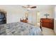 Comfortable bedroom featuring a ceiling fan, walk-in closet and ensuite bath at 3660 Hickory Se Cir, Smyrna, GA 30080