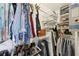 Well-organized walk-in closet with shelving and hanging space for clothes and accessories at 3660 Hickory Se Cir, Smyrna, GA 30080