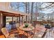 Inviting covered deck with outdoor seating, perfect for entertaining at 3660 Hickory Se Cir, Smyrna, GA 30080