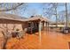 Open wooden deck features a grill, a table with chairs, and is perfect for enjoying outdoor living at 3660 Hickory Se Cir, Smyrna, GA 30080