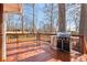 Outdoor grill with a stainless steel finish on a well-maintained wood deck at 3660 Hickory Se Cir, Smyrna, GA 30080