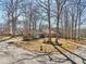 Corner lot with an attractive ranch-style home featuring a front porch and mature shade trees at 3660 Hickory Se Cir, Smyrna, GA 30080