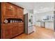 Well-equipped kitchen featuring a stainless steel refrigerator, wooden cabinet, and ample counter space at 3660 Hickory Se Cir, Smyrna, GA 30080