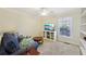 Comfortable living room with a TV, bookshelves, and a cozy sofa at 3660 Hickory Se Cir, Smyrna, GA 30080