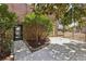 Brick home featuring a private side entrance, small brick garden, and fenced yard at 3660 Hickory Se Cir, Smyrna, GA 30080
