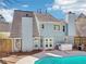 Inviting backyard featuring a private pool, spa, grill and outdoor space at 3812 Chalmers Ct, Clarkston, GA 30021