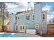Inviting backyard featuring a private pool, spa, grill and outdoor space at 3812 Chalmers Ct, Clarkston, GA 30021
