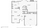 Detailed floorplan showcasing the layout of the home, including the kitchen, living room, and garage at 3812 Chalmers Ct, Clarkston, GA 30021