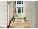 Inviting front entrance with stone steps, decorative planters, and a charming doormat, creating a warm welcome at 3812 Chalmers Ct, Clarkston, GA 30021