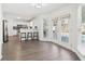 Eat-in kitchen featuring white cabinets, stainless appliances, and a door leading to the pool at 3812 Chalmers Ct, Clarkston, GA 30021