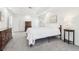 Bedroom showcasing neutral colors, with lots of space, light, and ample storage at 3812 Chalmers Ct, Clarkston, GA 30021
