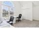 Home office with a large window with natural light, a work space, and closet at 3812 Chalmers Ct, Clarkston, GA 30021