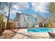 Enjoy outdoor living with this backyard featuring a refreshing pool, perfect for relaxation and entertainment at 3812 Chalmers Ct, Clarkston, GA 30021