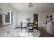 Bright dining area with hard wood floors, adjacent to the kitchen and featuring modern decor at 2222 Hill Nw St, Atlanta, GA 30318