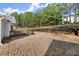 Large backyard with a deck at 3669 White Sands Way, Suwanee, GA 30024